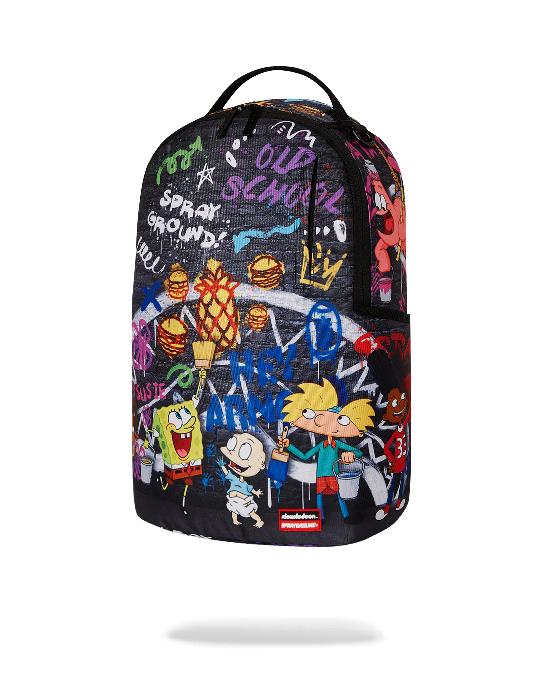 sprayground backpack showcasing various 90s nicktoons characters and graffiti designs
