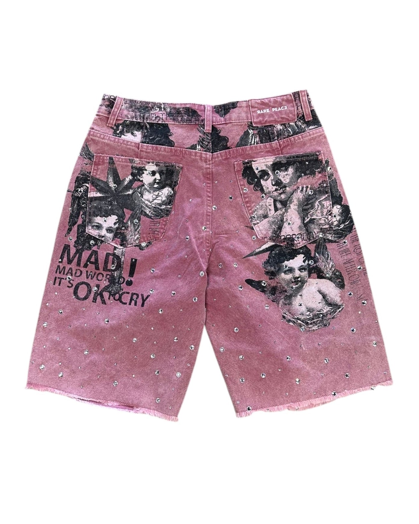 Pink shorts with graphic designs and text on a white background