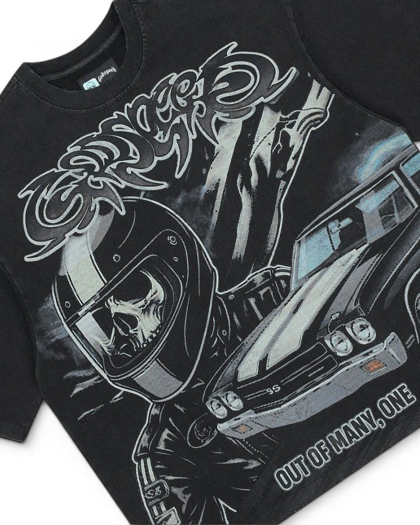 Black t-shirt with graphic design of a person on a motorcycle and text 'Out of many, one'.