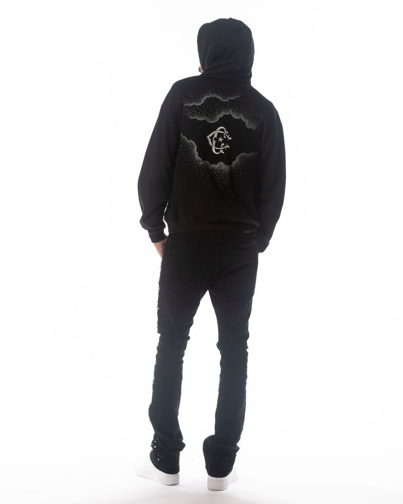 Person wearing a black hoodie with a design on the back against a white background