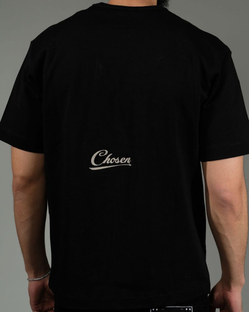 Back view of black Angel of the Lord Tee by Chosen featuring gothic scripture graphic