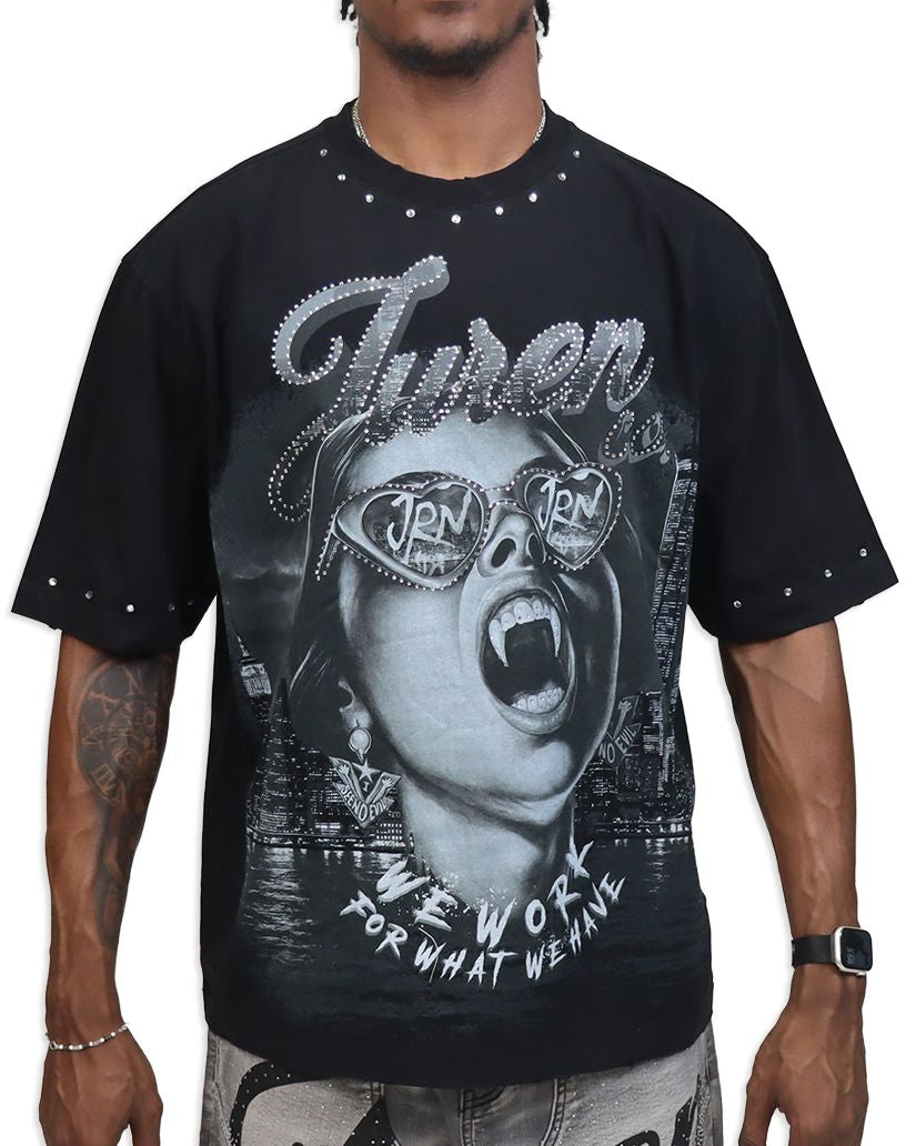 Person wearing a black t-shirt with graphic design and text