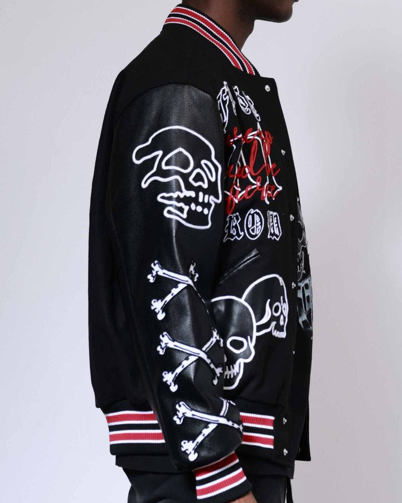 Black varsity jacket with skull and crossbones design on a white background
