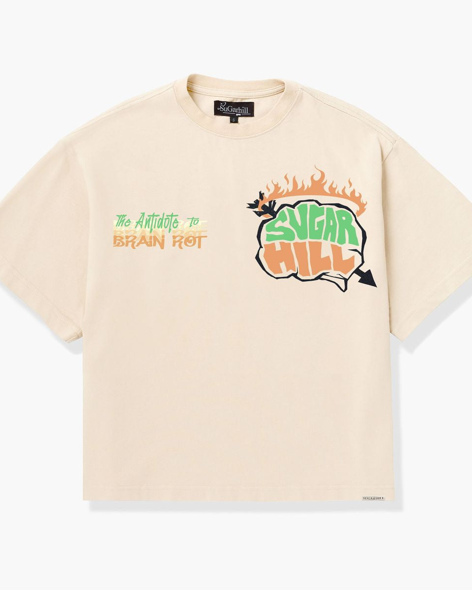 Beige t-shirt with graphic design and text on a white background