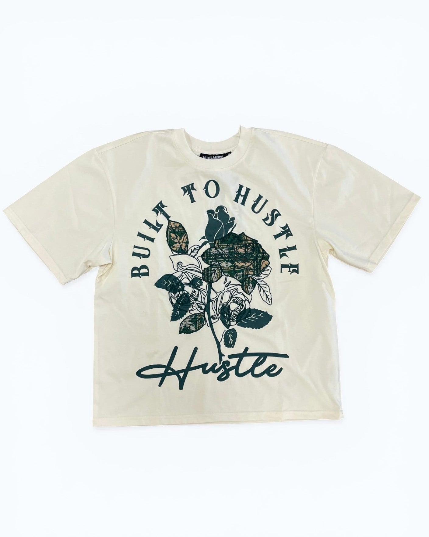 Beige t-shirt with floral design and 'Built to Hustle' text on a white background
