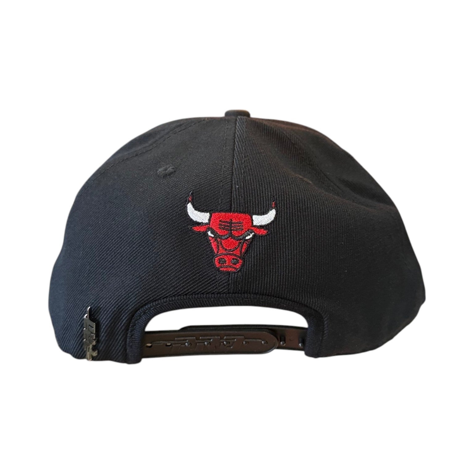 Black cap with a red bull logo on a white background