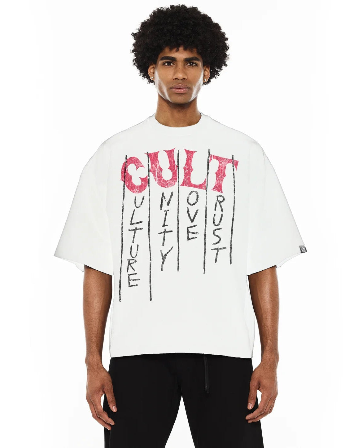 Person wearing a white t-shirt with text design on a white background