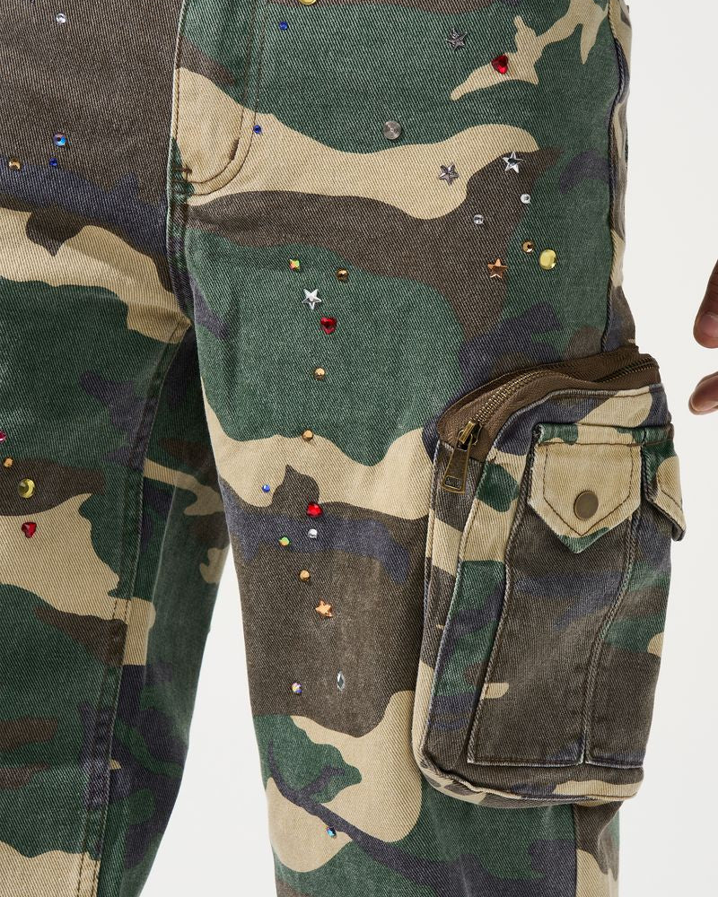 Camouflage pants with decorative elements on a white background
