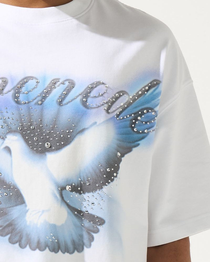 White t-shirt with a graphic design of doves and text on a plain background