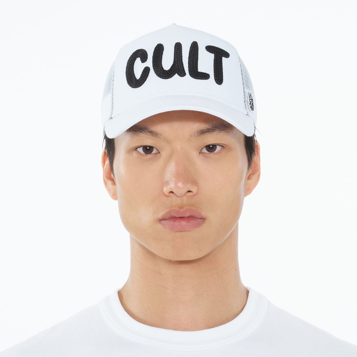 Cult of individuality chain logo trucker hat in white