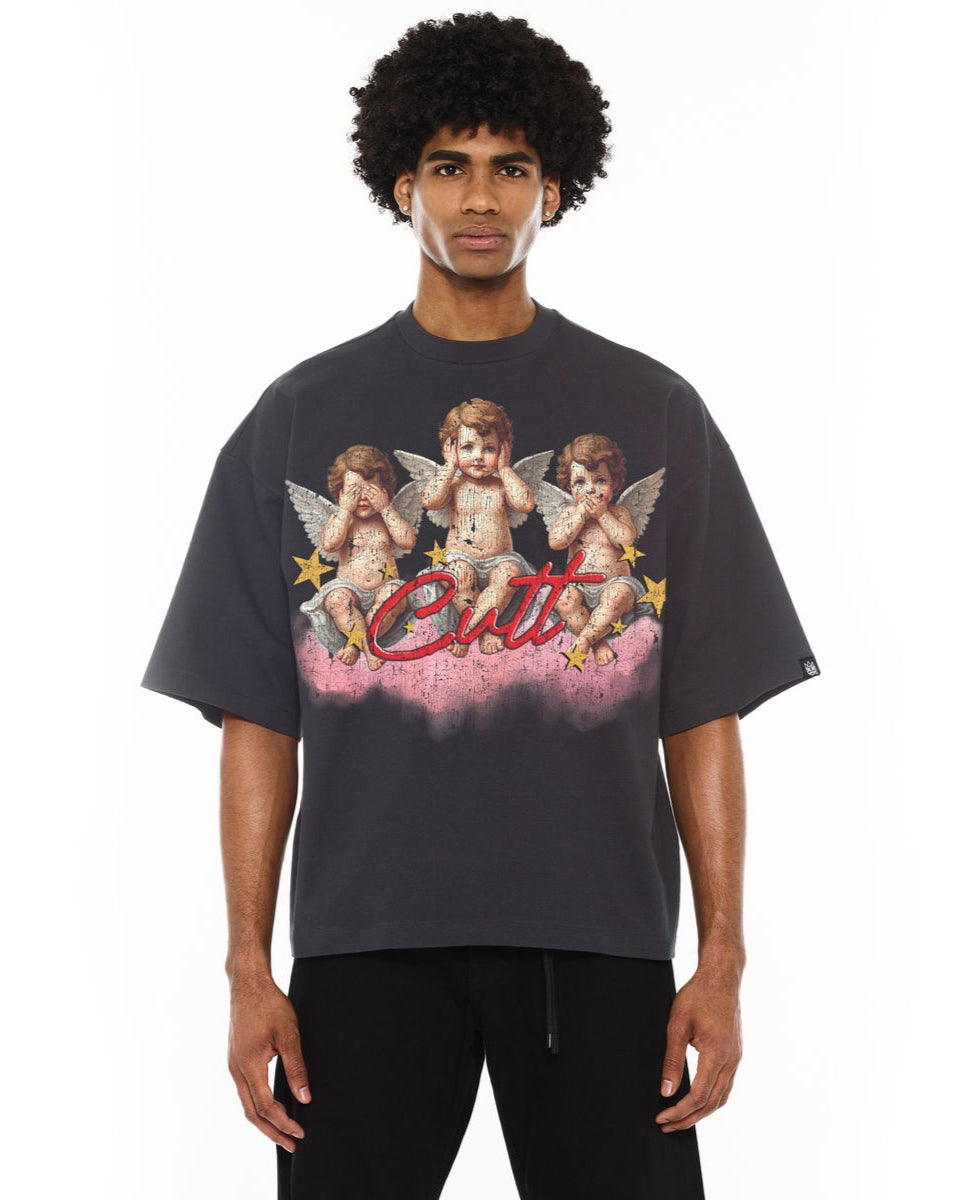 Person wearing a charcoal t-shirt with angel graphic and 'Cult' text on a white background