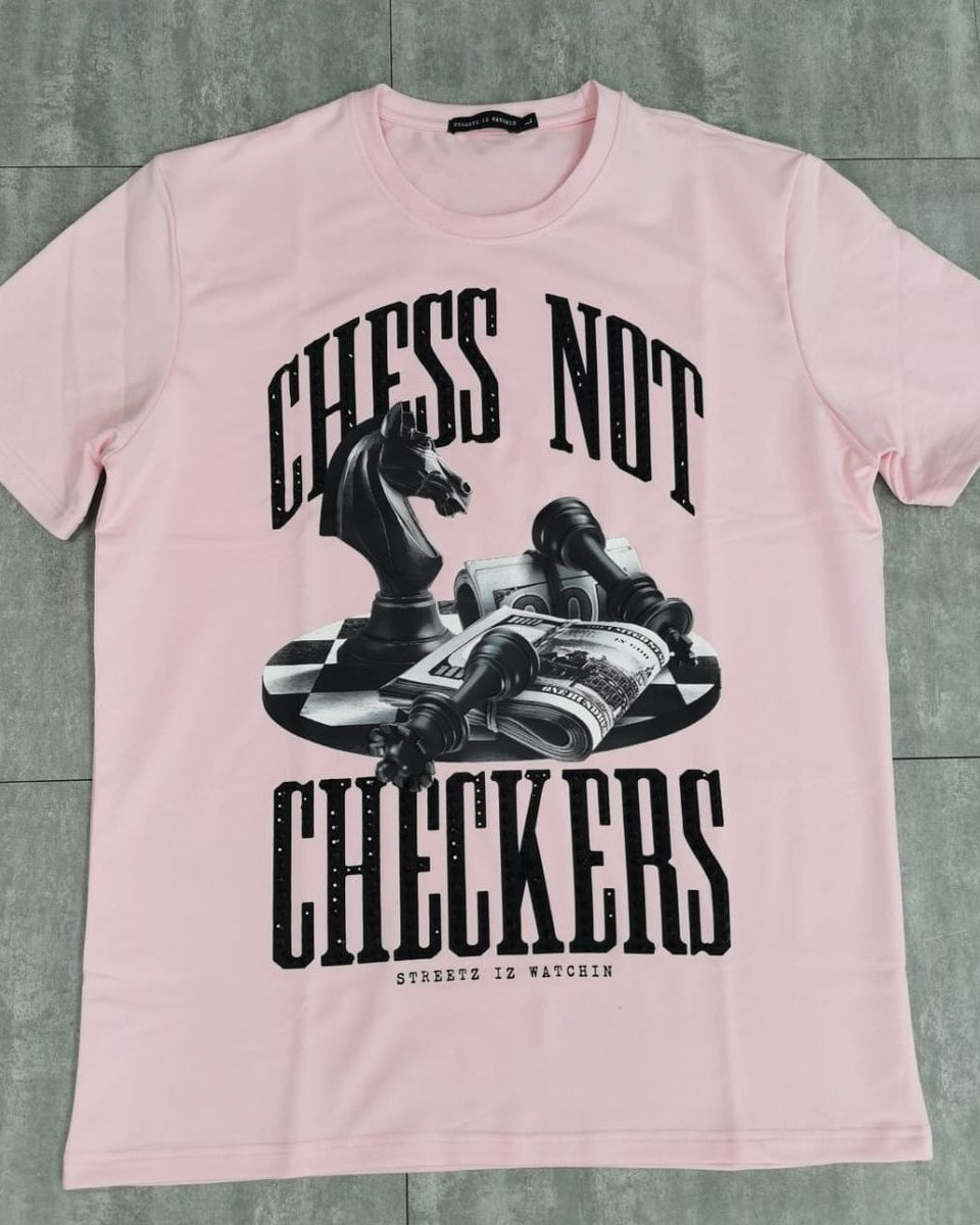 Pink t-shirt with chess-themed graphic and text on a gray background