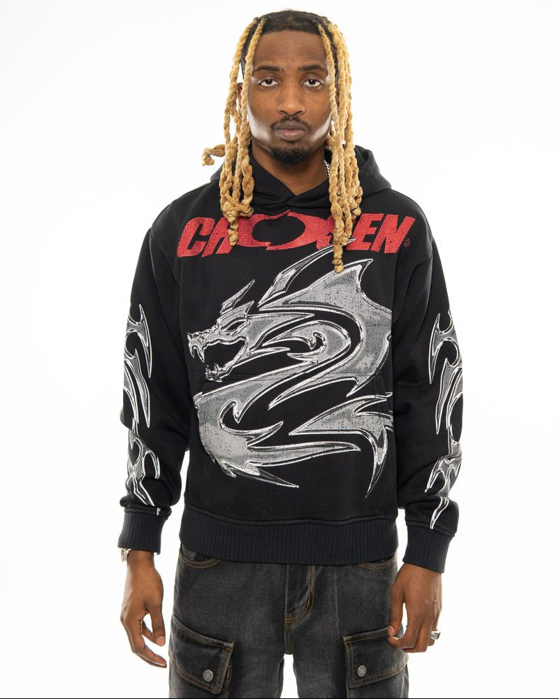 Person wearing a black hoodie with a dragon design and red text on a white background