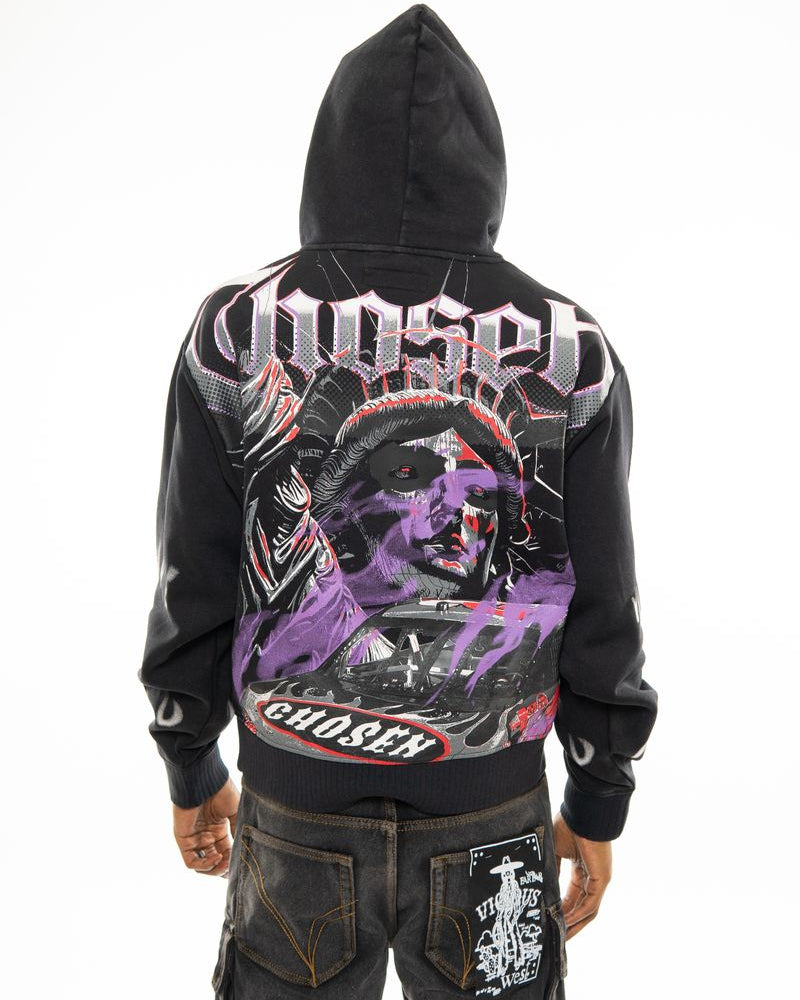 Black hoodie with graphic design on the back, worn by a person, on a white background