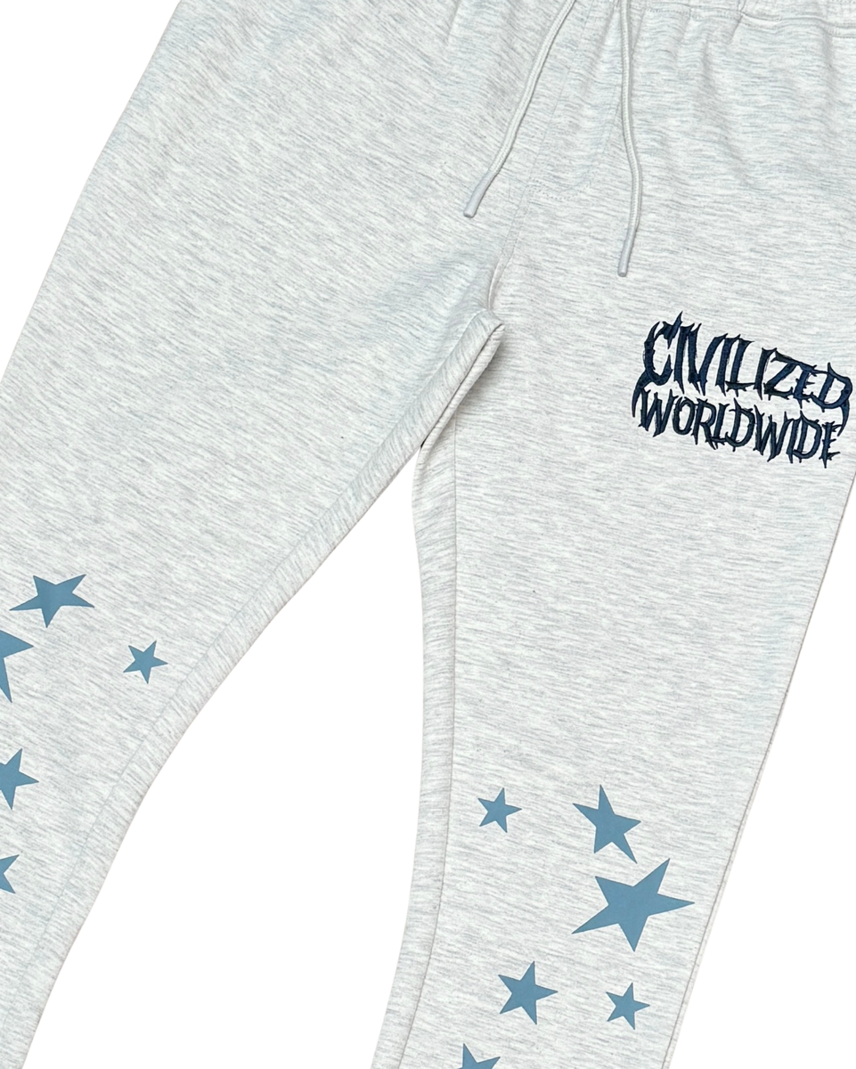 Gray sweatpants with star patterns and 'Civilized Worldwide' text on a white background