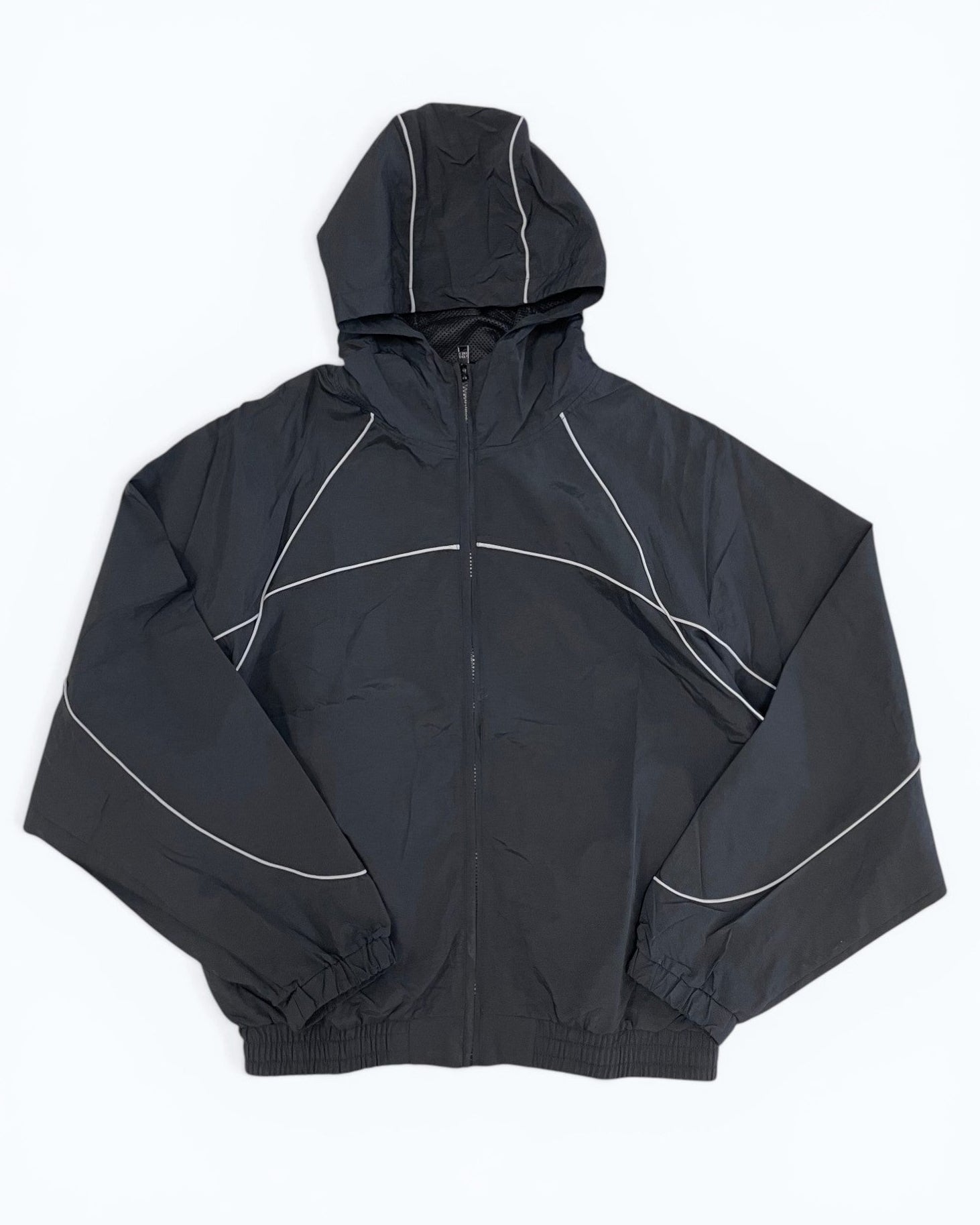 Black jacket with white accents on a white background