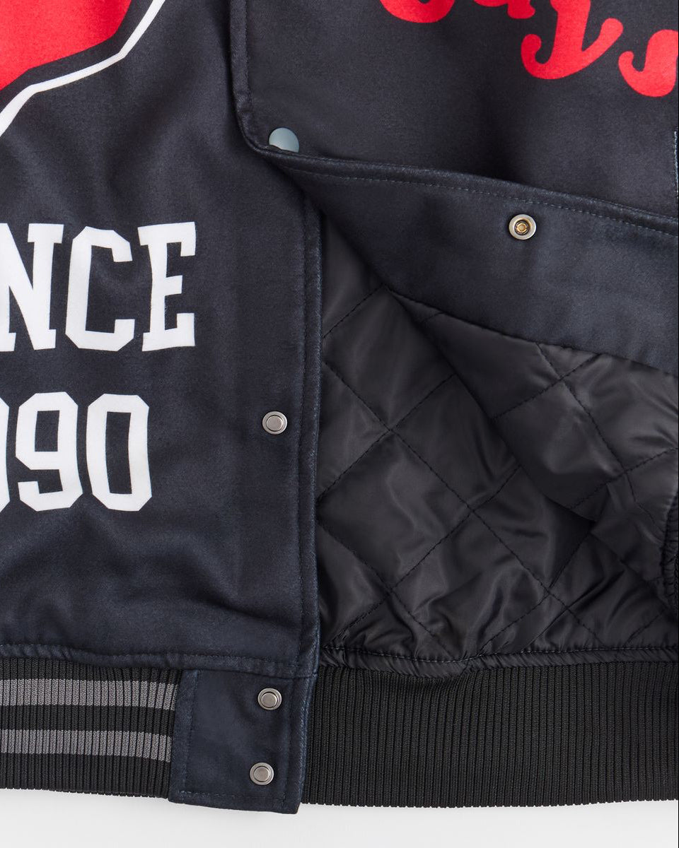 Navy blue varsity jacket with white text and red accents on a white background