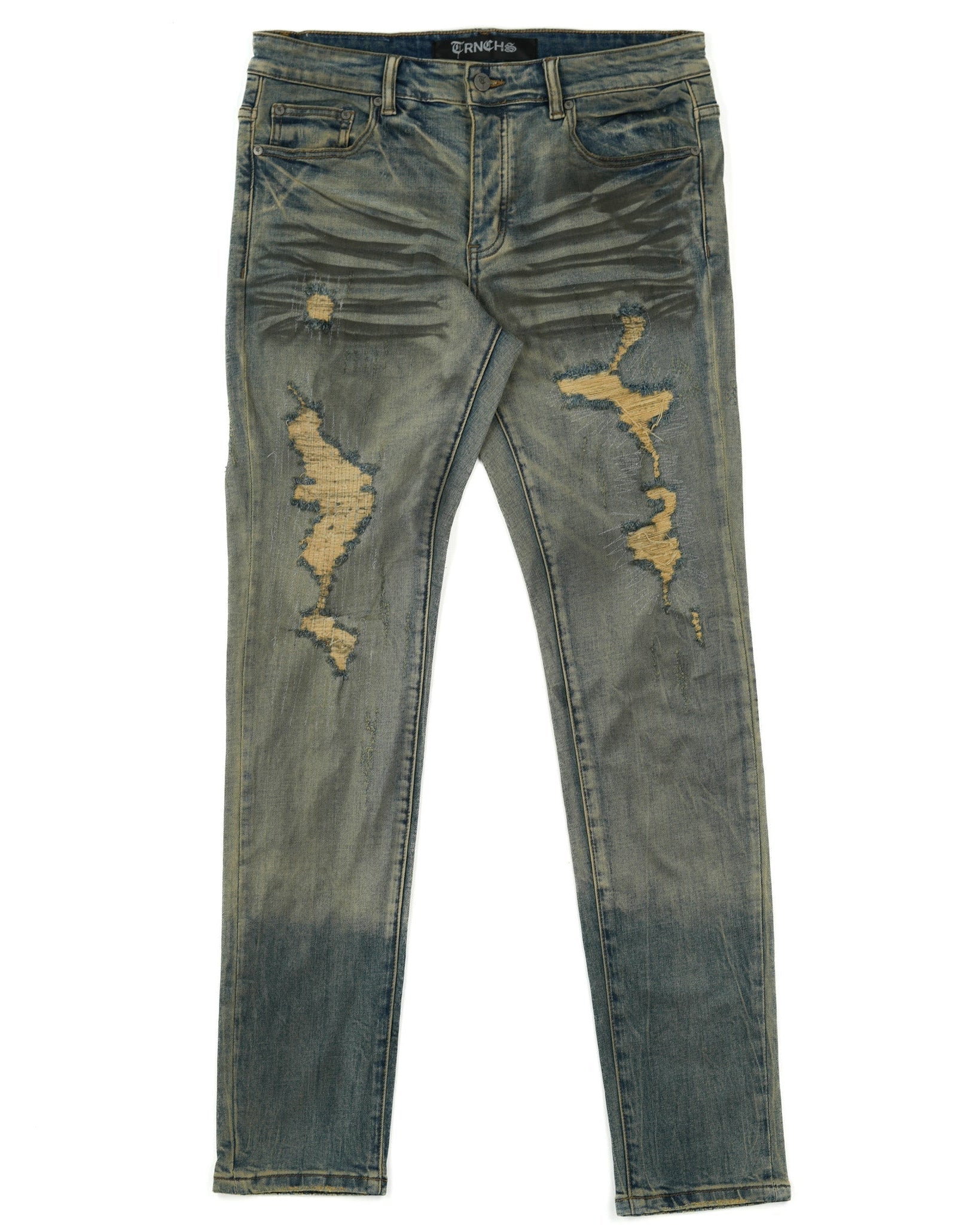 Distressed blue jeans on a white background