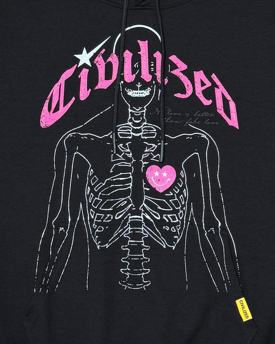 Black hoodie with skeleton design and pink text on a black background