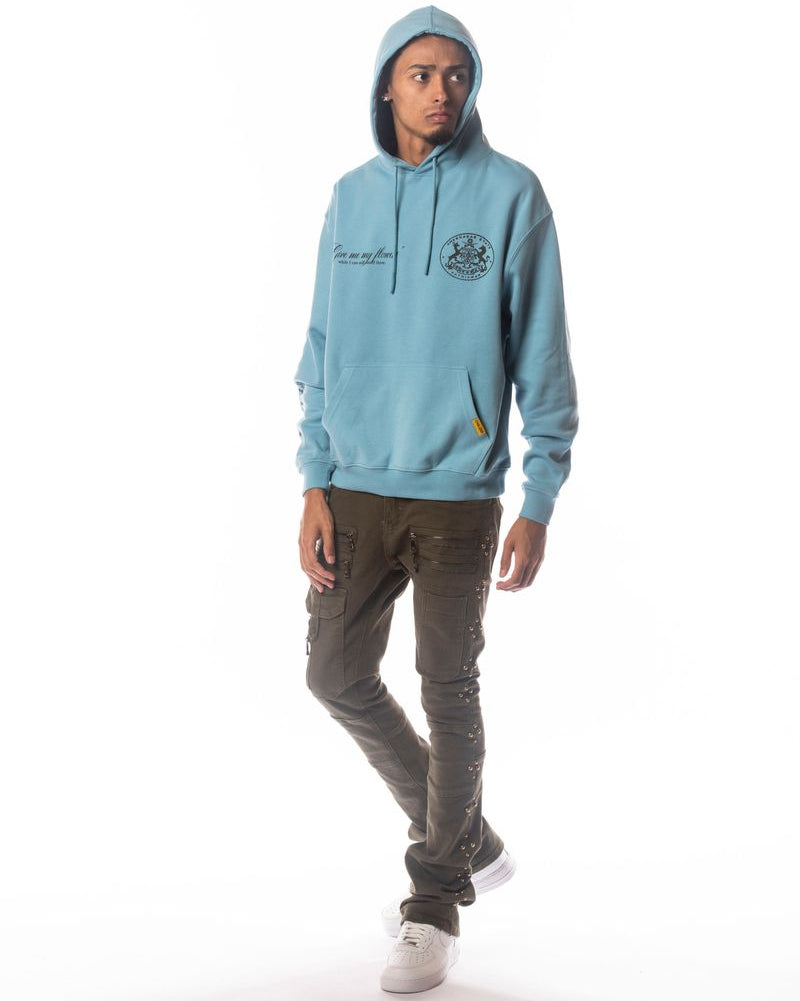 Person wearing a light blue hoodie with a logo on a white background