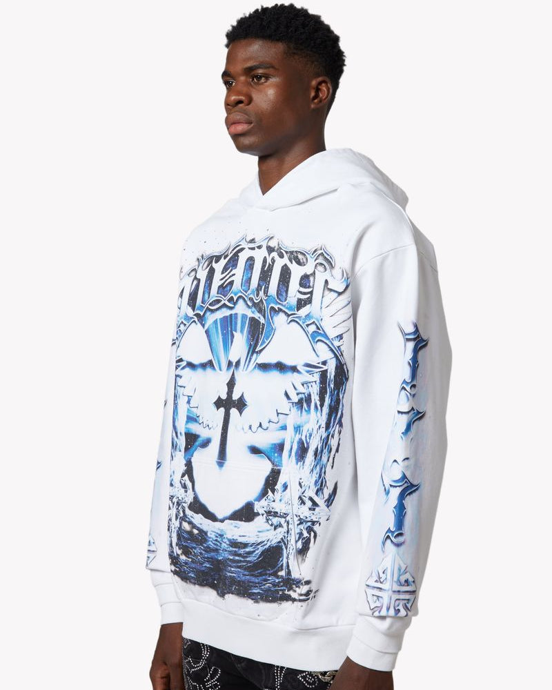 Person wearing a white hoodie with graphic design on a white background