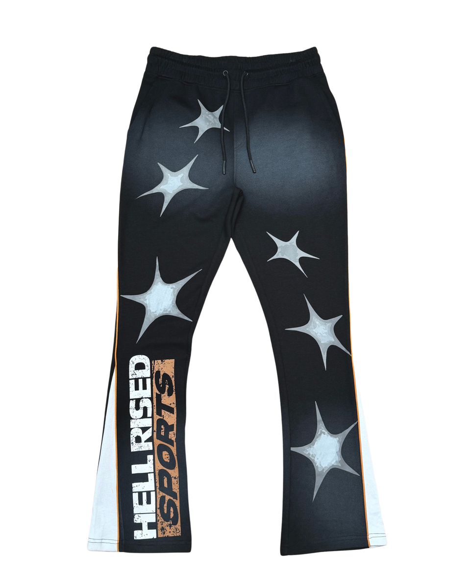 Black pants with star patterns and 'Hell Rised Sports' branding on a white background