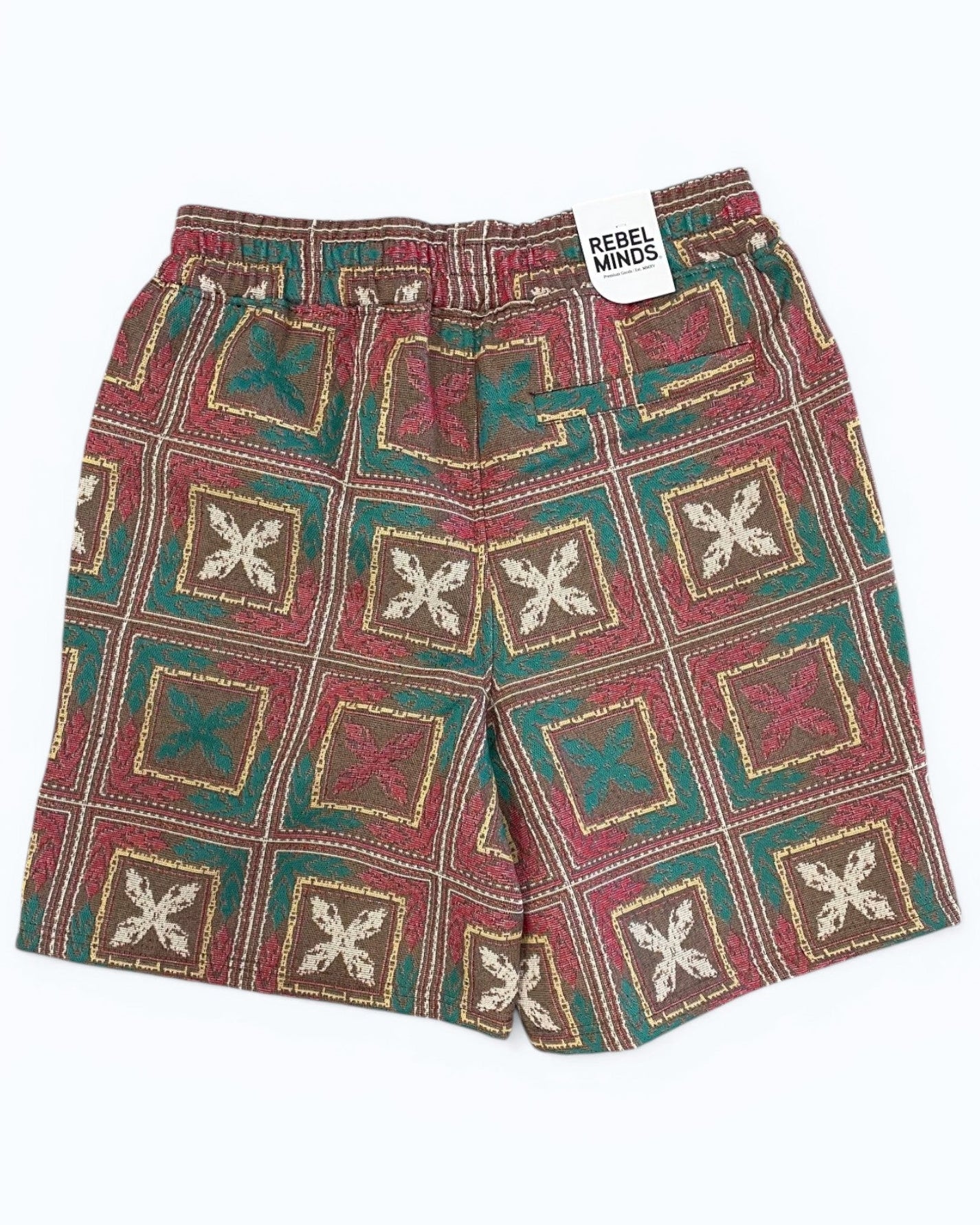 Patterned shorts with a visible brand tag on a white background