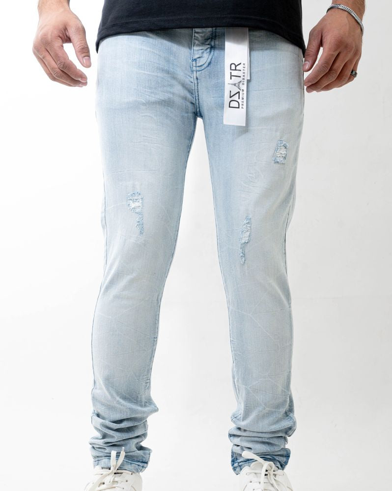 Light blue jeans with a brand label on a white background