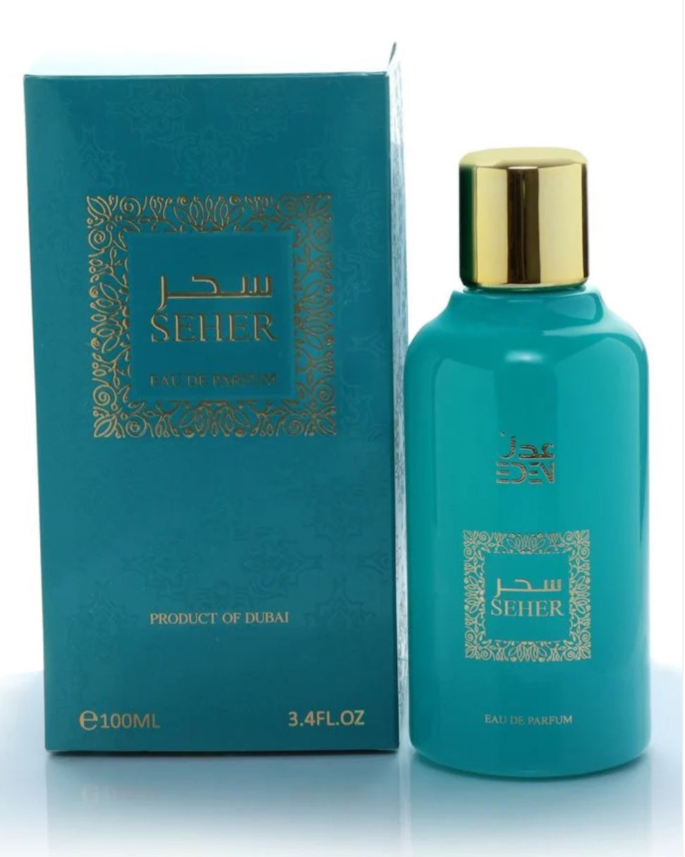A turquoise bottle of Seher Arab Eau de Parfum with a gold cap, alongside its packaging box with Arabic script.