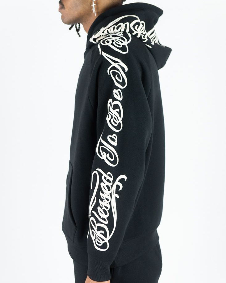 Black hoodie with white text design on a plain background