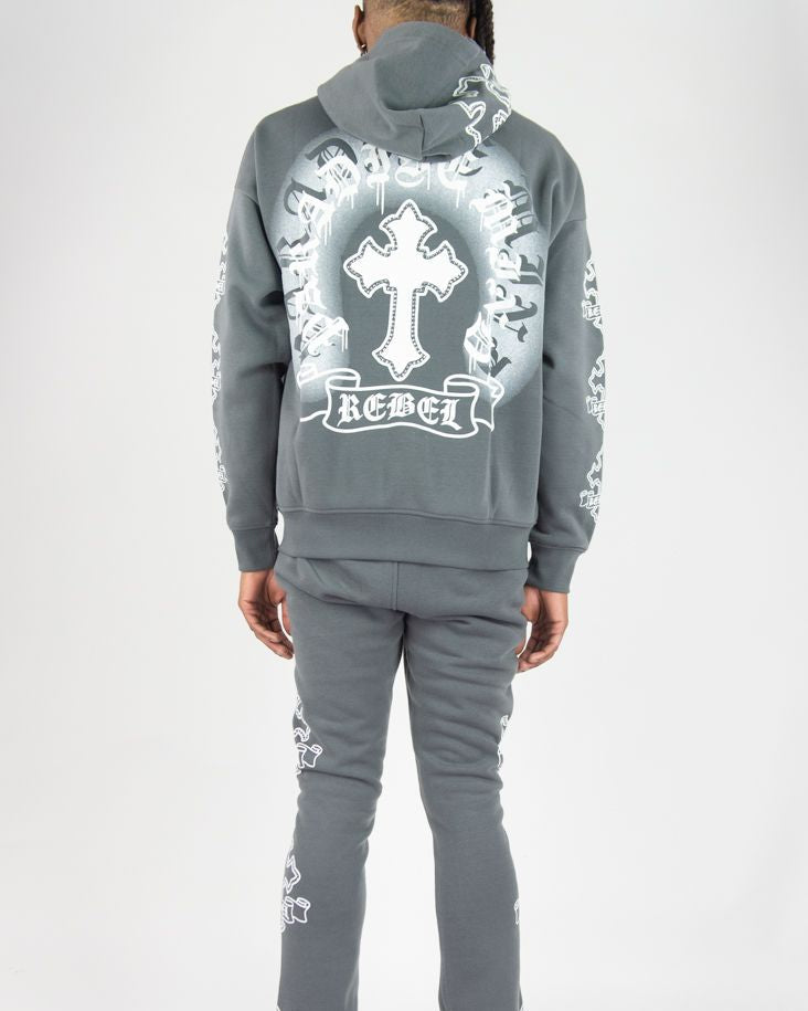 Gray hoodie and pants set with cross and 'REBEL' design on a white background