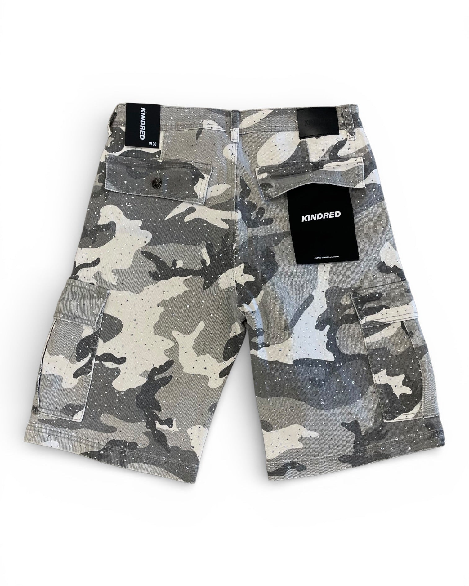 Camouflage shorts with a brand tag on a white background