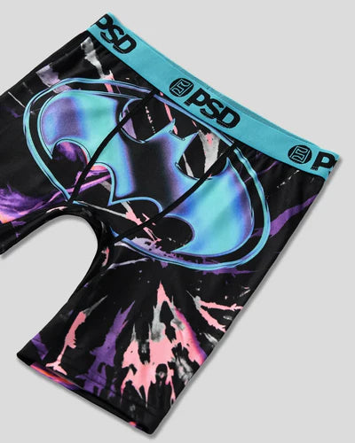 Neck gaiter with tie-dye design and 'PSD' branding on a gray background