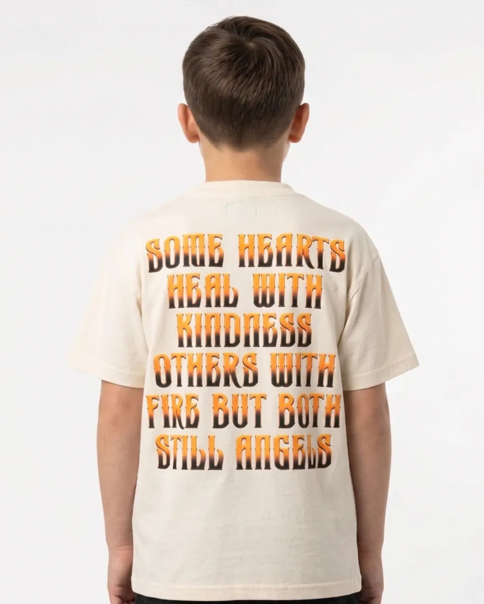 Child wearing a t-shirt with a motivational quote on the back against a white background