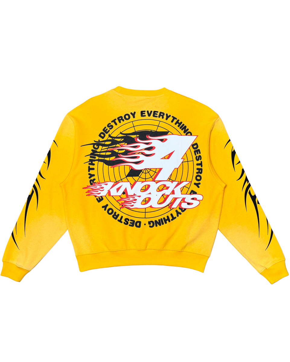 Yellow sweatshirt with graphic designs and text on a white background