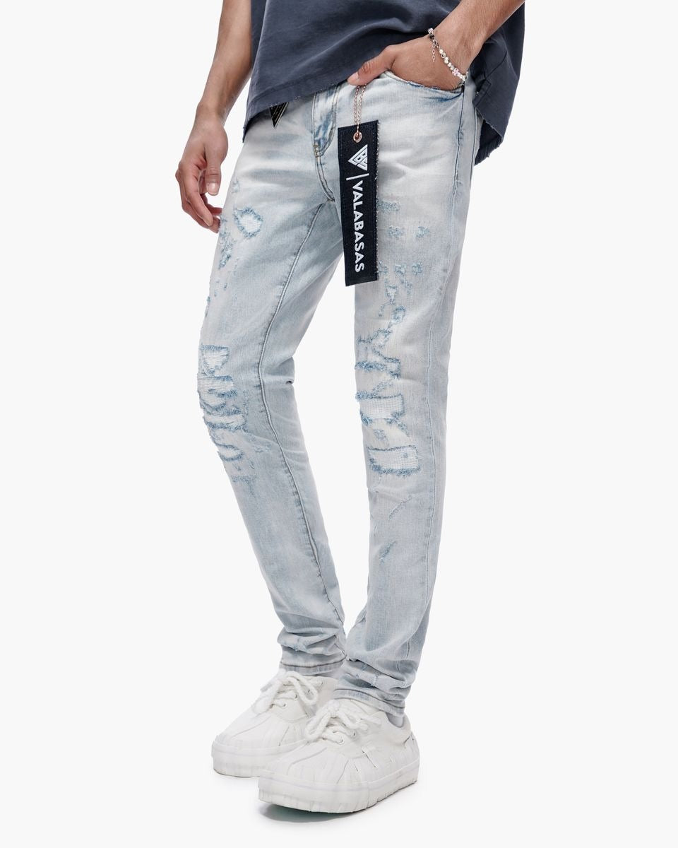 Light blue jeans with a brand label on a white background