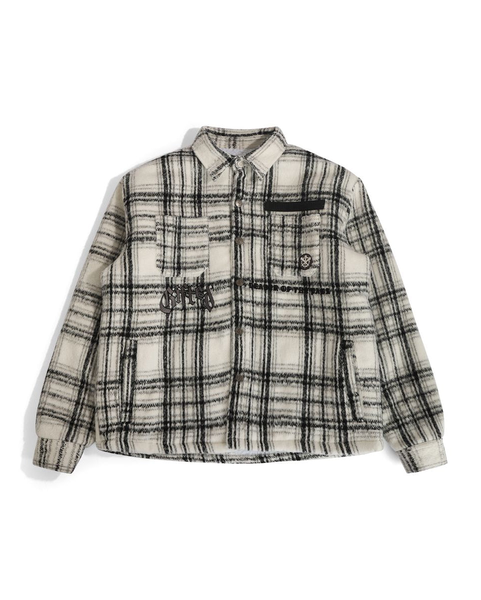 Plaid shirt with black accents on a white background