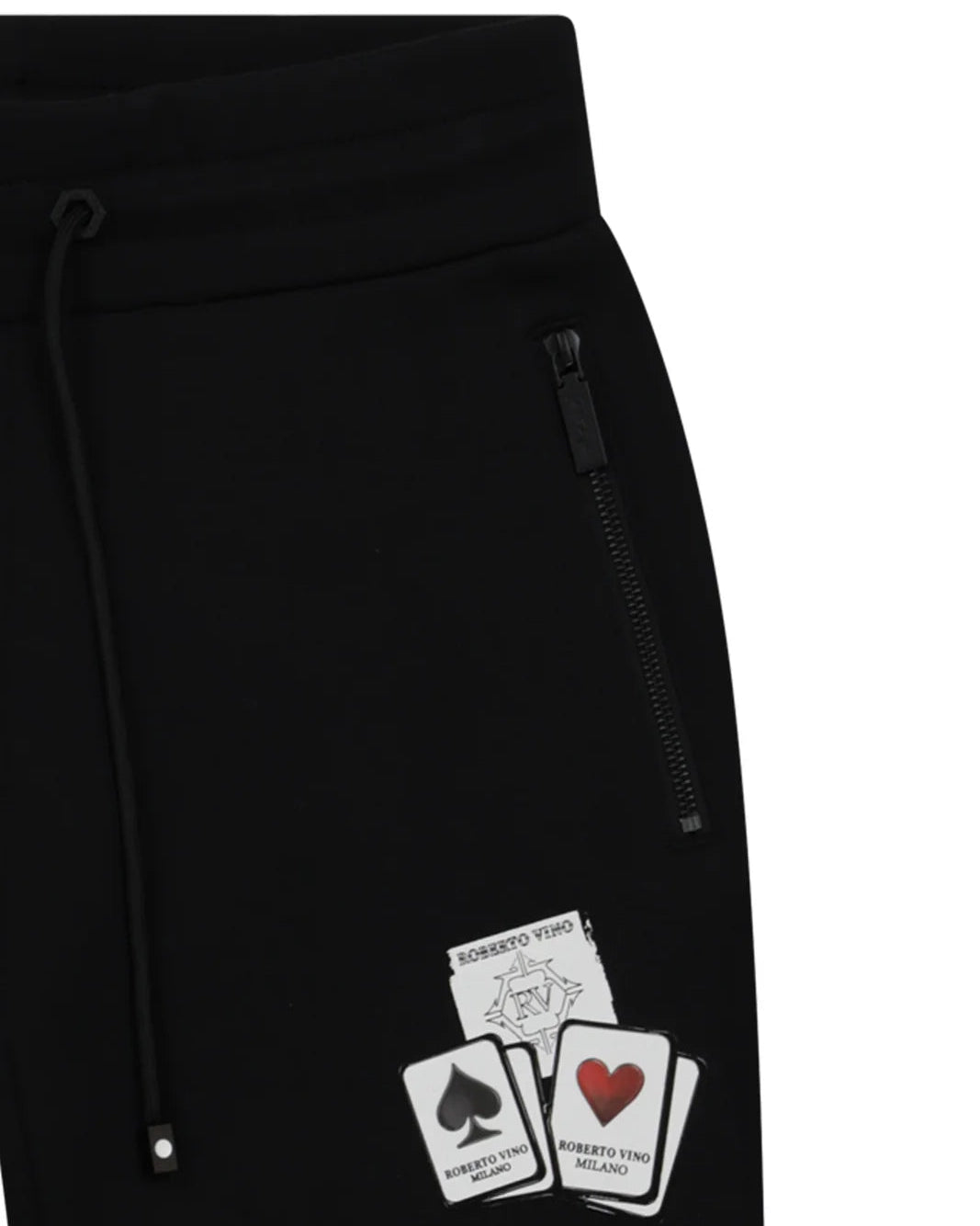Black pants with card design patches on a white background