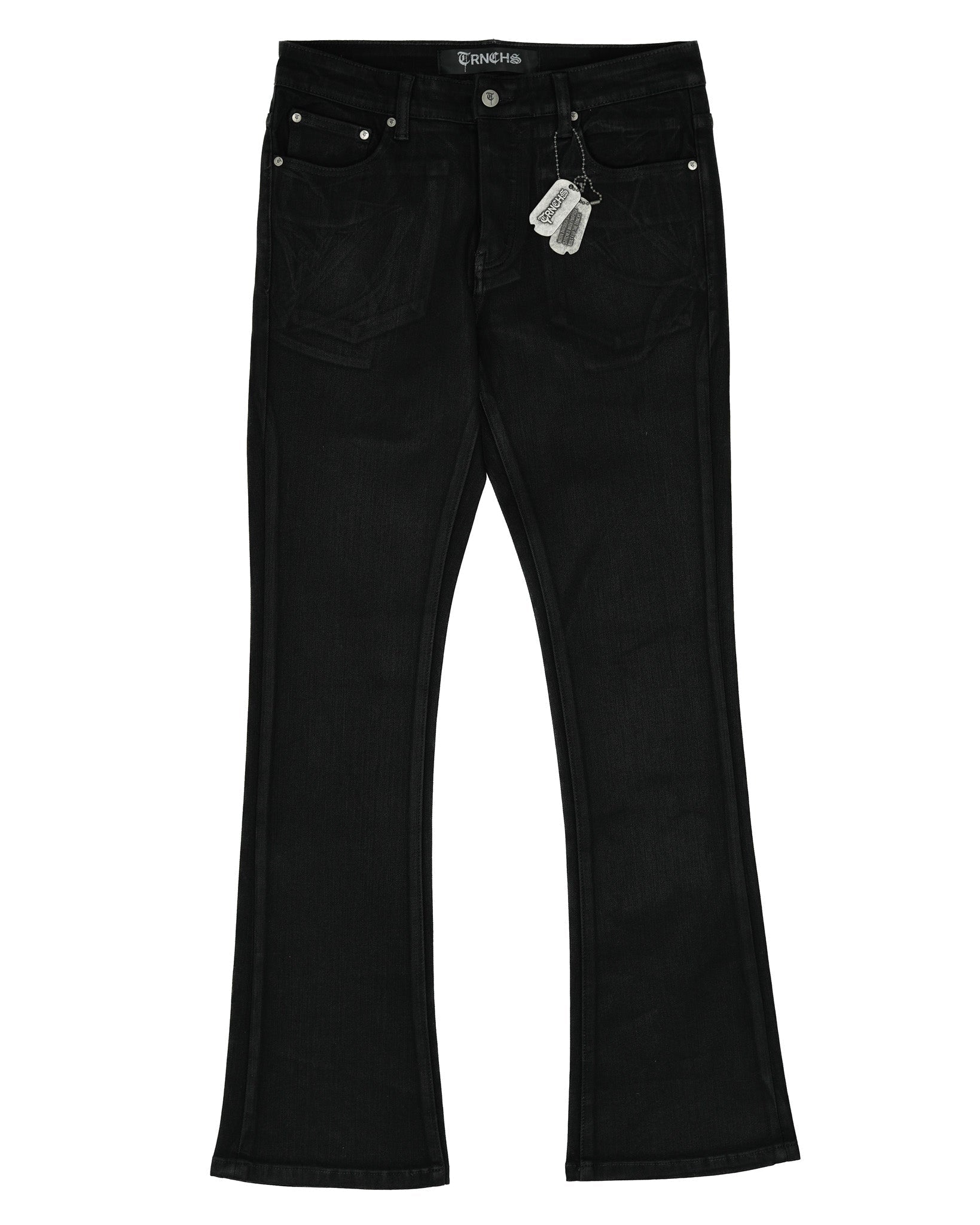 Black jeans with a tag on a white background