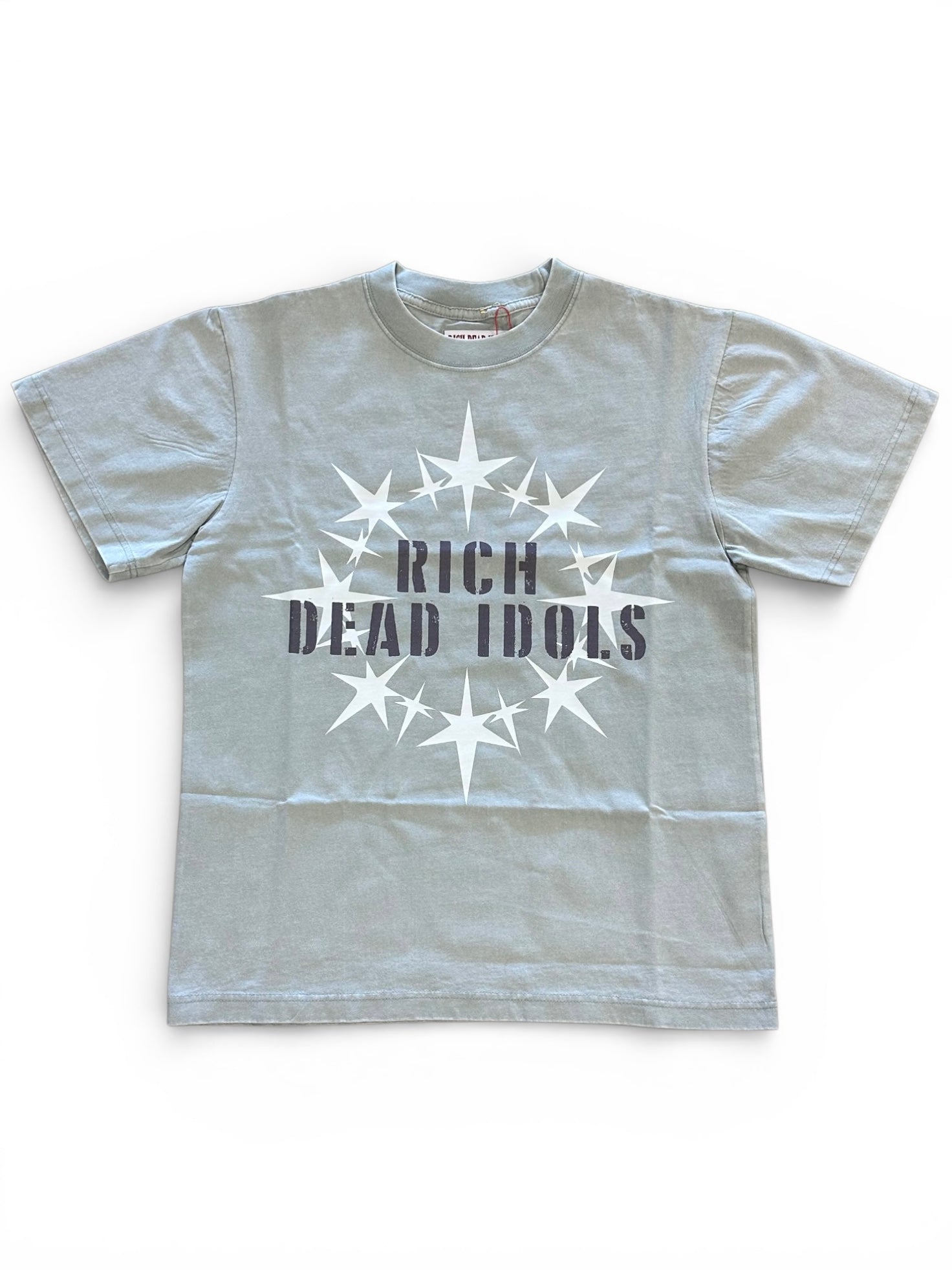 Gray t-shirt with 'Rich Dead Idols' text and star designs on a white background