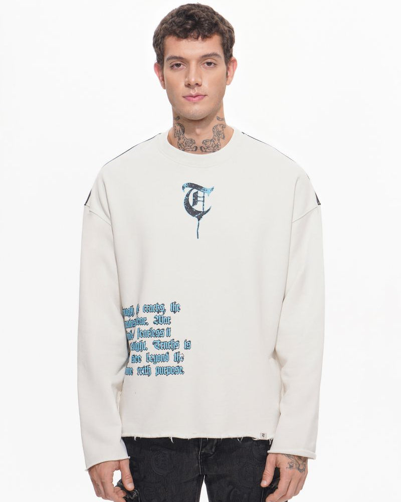 Man wearing a white sweatshirt with text and graphics on a white background