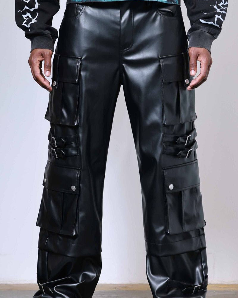 Black leather cargo pants worn by a person on a plain background