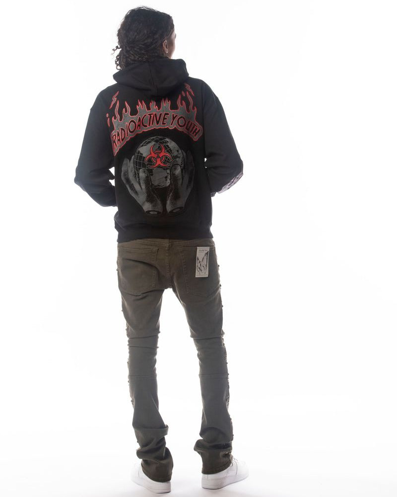 Person wearing a black hoodie with red text and graphics on the back, standing against a white background.
