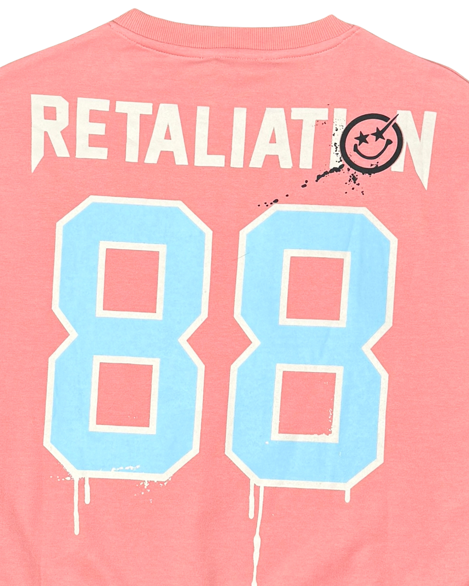 Pink shirt with 'RETALIATION 88' printed on the back