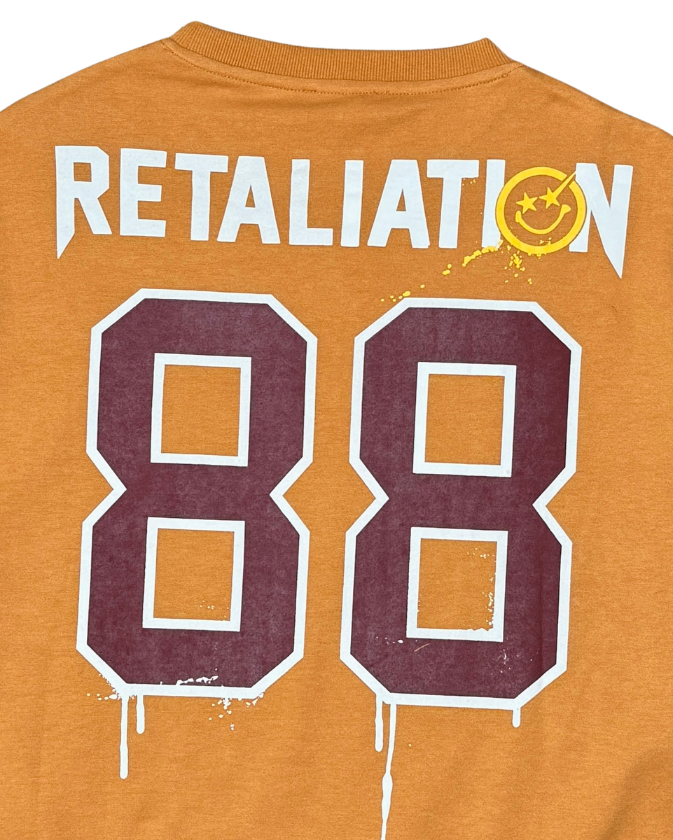 Orange shirt with 'RETALIATION' and '88' printed on it