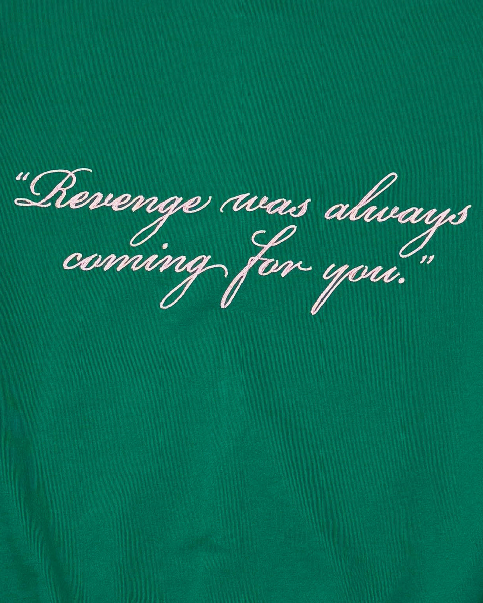 Green t-shirt with white text 'Revenge was always coming for you.'
