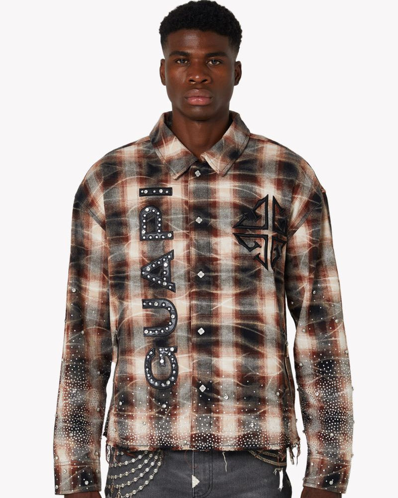 Man wearing a plaid shirt with 'Guapi' branding on a white background