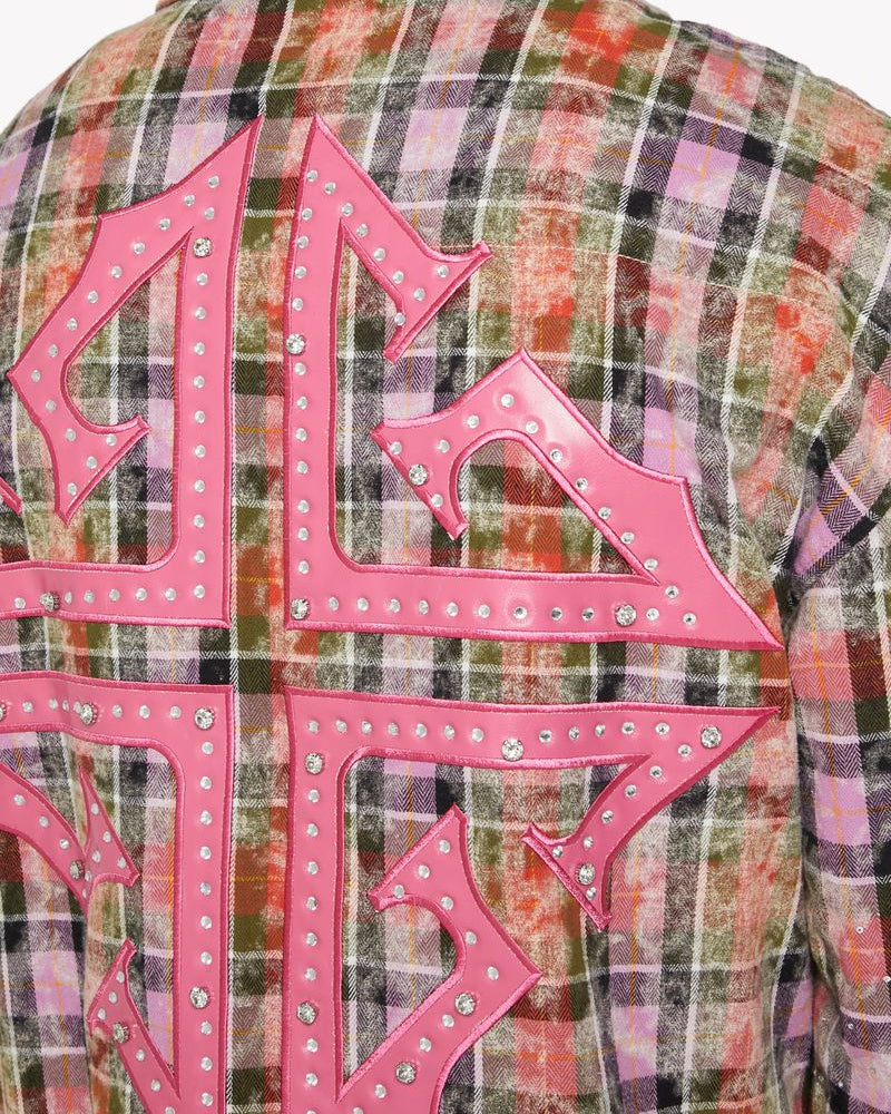 Plaid shirt with pink lettering and rhinestones on a plain background