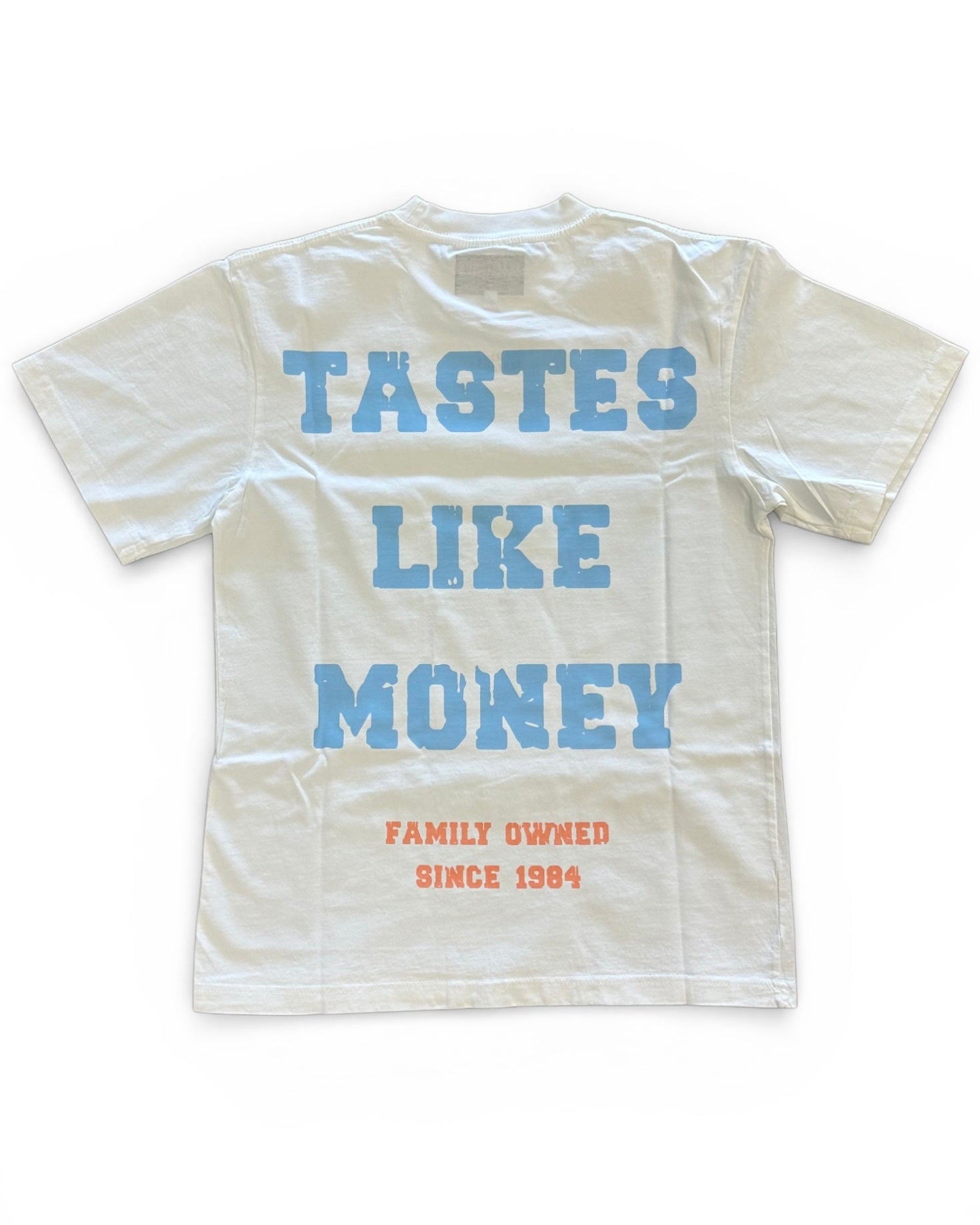 White t-shirt with blue and red text on a white background