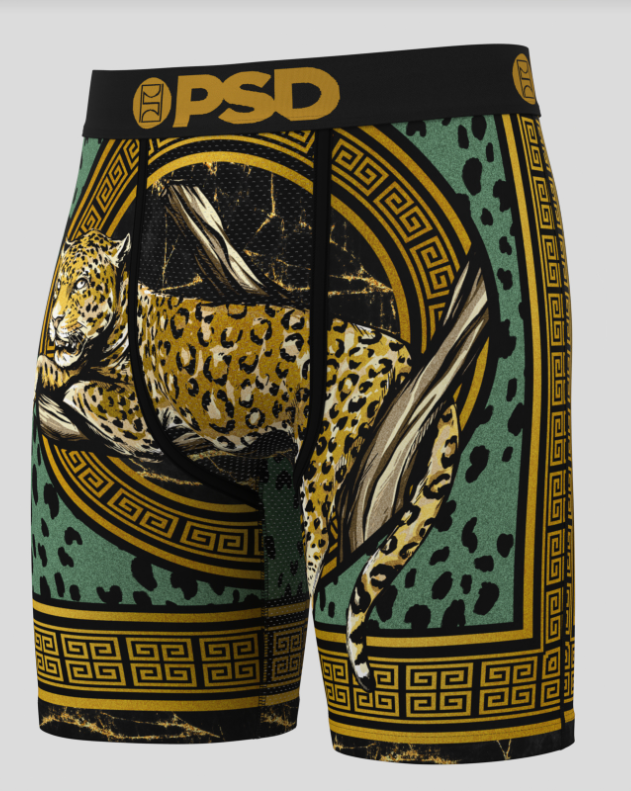 Leopard print boxer briefs with decorative patterns and 'PSD' branding on a gray background